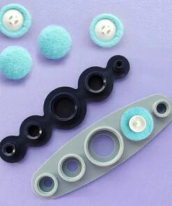 Ompelija käsityön peitetty nappikone